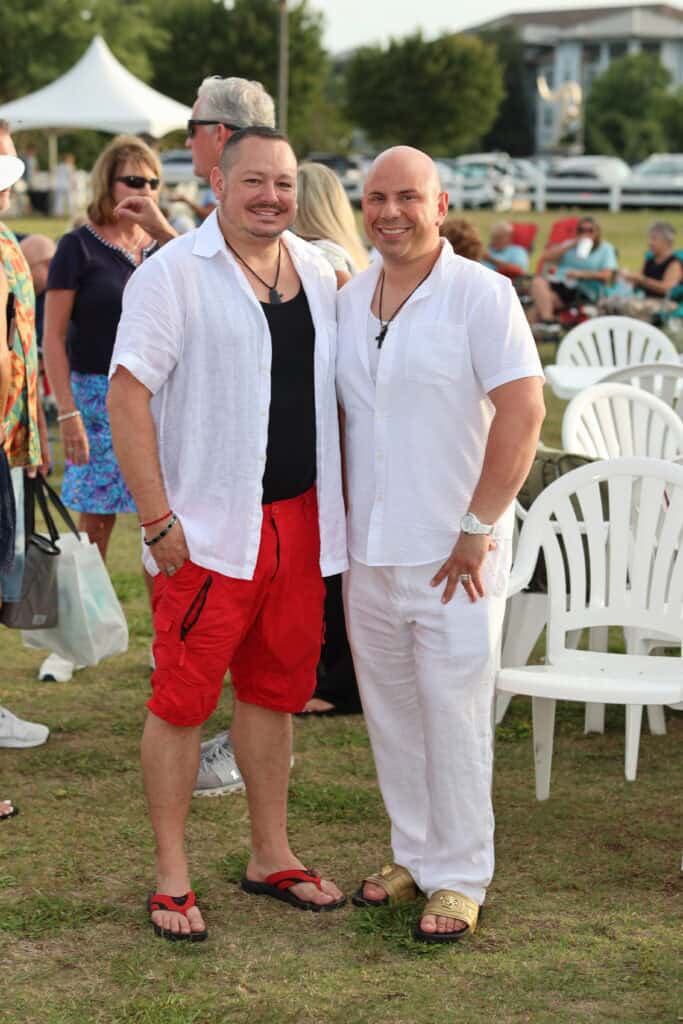 Chad Kalantzis-Stanton & Ryan Stanton at the 2026 Concerts in the Village Featuring Boogie Wonder Band in Destin, Florida.