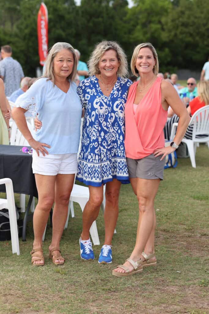 Kathy Whidden, Scherie Havard & Andrea Korenek at the 2026 Concerts in the Village Featuring Boogie Wonder Band in Destin, Florida.