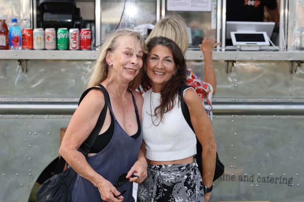 Mickey Devine & Yvonne Kristufek at the 2026 Concerts in the Village Featuring Boogie Wonder Band in Destin, Florida.