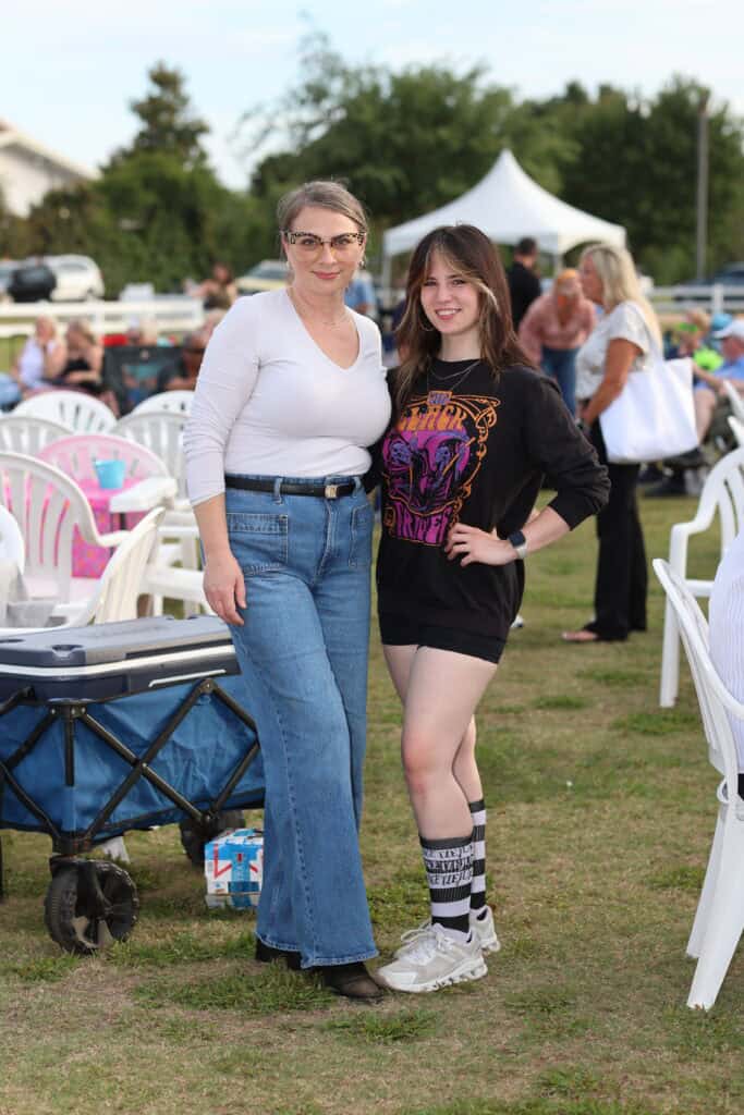 Sarah Baker & Grace Luberto at the 2026 Concerts in the Village Featuring Boogie Wonder Band in Destin, Florida.