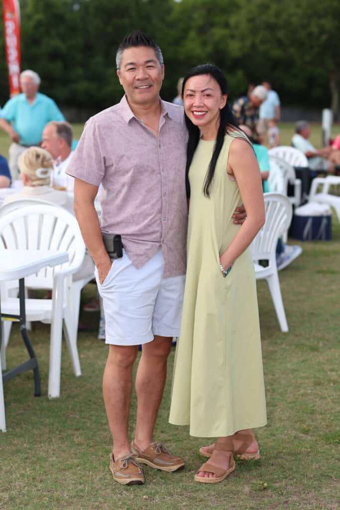 Tuan & Oanh Nguyen at the 2026 Concerts in the Village Featuring Boogie Wonder Band in Destin, Florida.