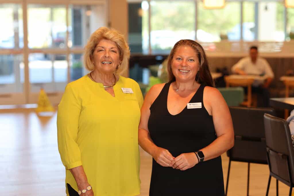 Barbara Slocumb & Christina LeonGonzalez at the Impact100 of Northwest Florida 2026 Member and Grant Number Reveal in Fort Walton Beach, Florida.