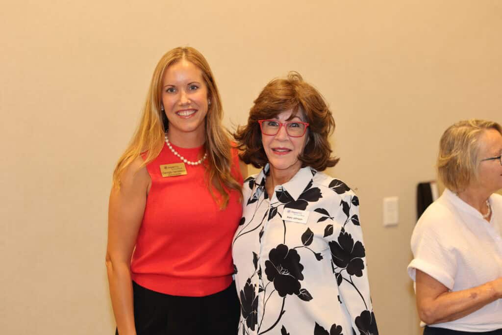 Georgia Henderson & Barry Johnson at the Impact100 of Northwest Florida 2026 Member and Grant Number Reveal in Fort Walton Beach, Florida.