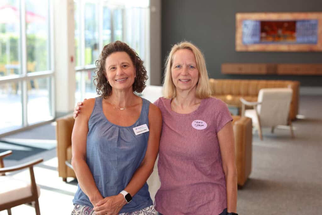 Gretchen Loffler & Tracy Strom at the Impact100 of Northwest Florida 2026 Member and Grant Number Reveal in Fort Walton Beach, Florida.