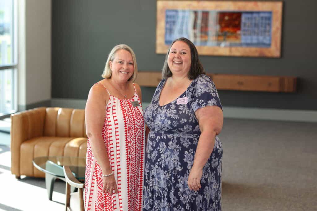 Joni Wallace & Kelley Joneson at the Impact100 of Northwest Florida 2026 Member and Grant Number Reveal in Fort Walton Beach, Florida.