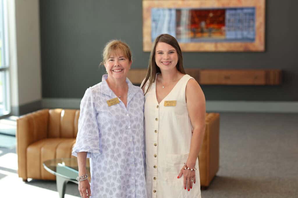 Suzy Smith & Allie Noah at the Impact100 of Northwest Florida 2026 Member and Grant Number Reveal in Fort Walton Beach, Florida.