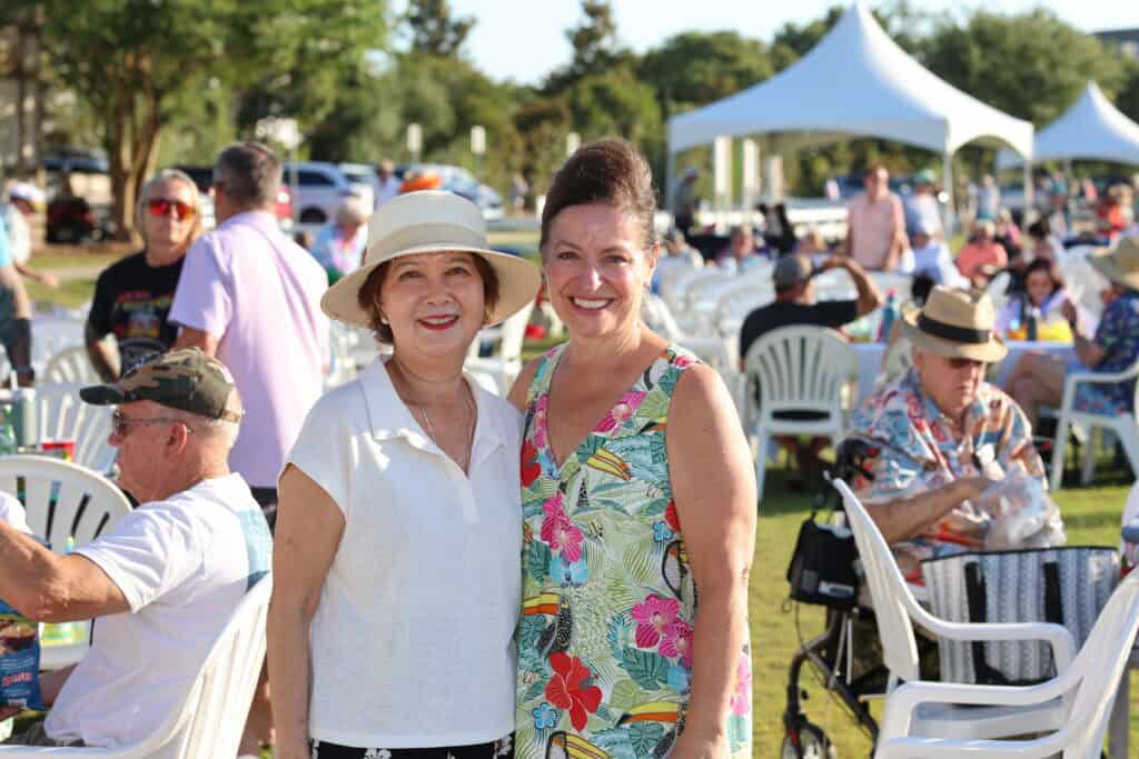 Catherine Liberatore & Sheryl Lauria at the 2026 Concerts in the Village Featuring A1A - The Official Jimmy Buffet Tribute Band in Destin, FL.