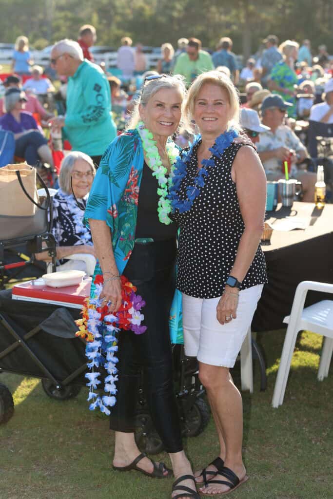 Jackie Ely & Cris Schilling at the 2026 Concerts in the Village Featuring A1A - The Official Jimmy Buffet Tribute Band in Destin, FL.