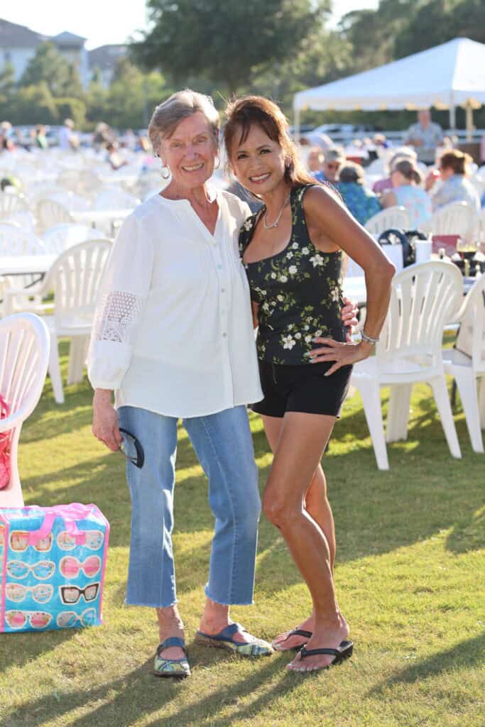 Milda Fair & Van Hughes at the 2026 Concerts in the Village Featuring A1A - The Official Jimmy Buffet Tribute Band in Destin, FL.