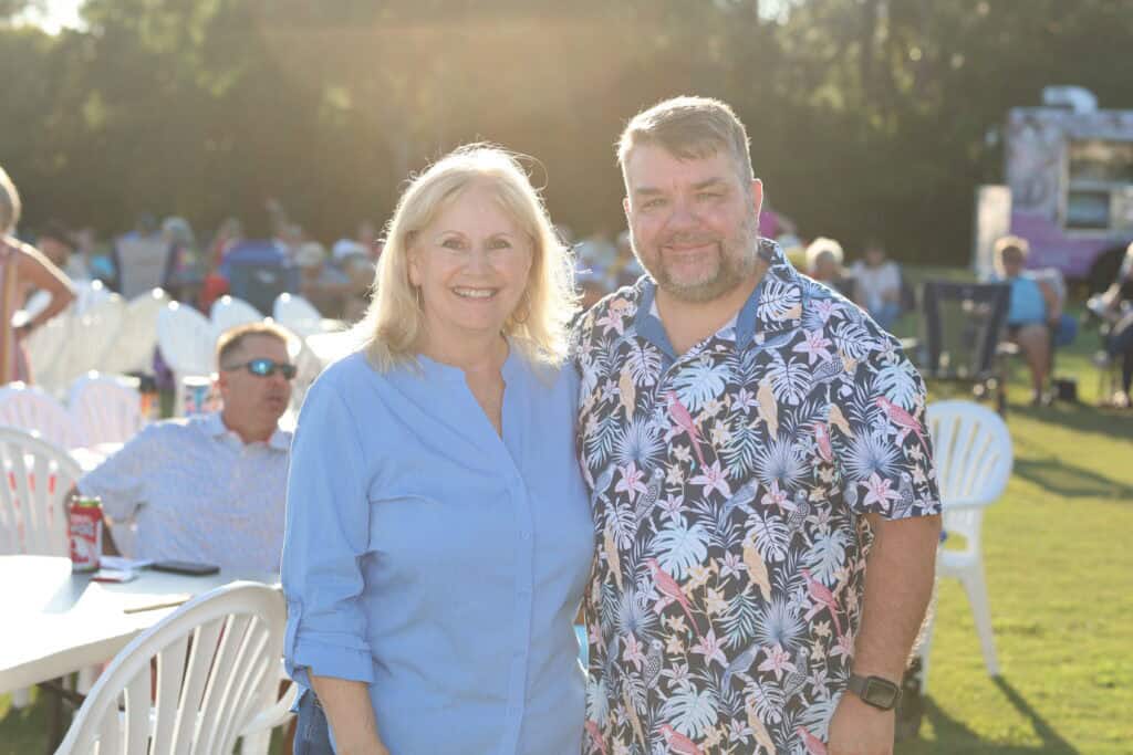 Sharon & Scott Beavers at the 2026 Concerts in the Village Featuring A1A - The Official Jimmy Buffet Tribute Band in Destin, FL.