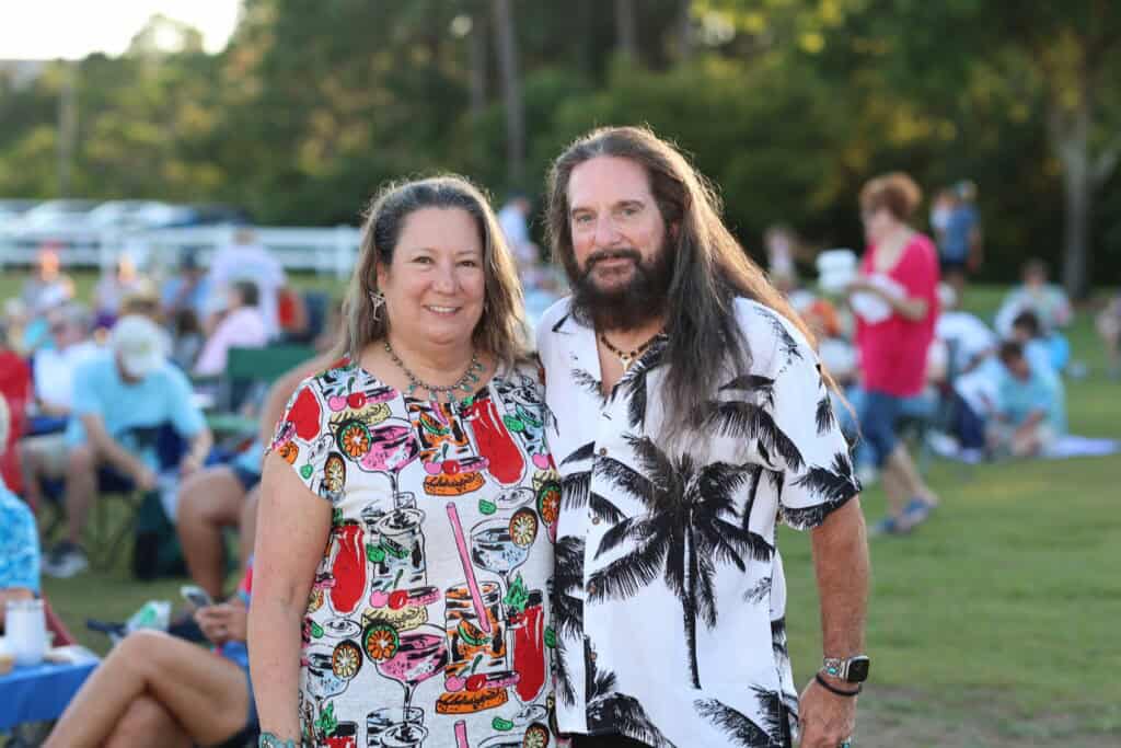 Sharon Irish & Brian Martini at the 2026 Concerts in the Village Featuring A1A - The Official Jimmy Buffet Tribute Band in Destin, FL.