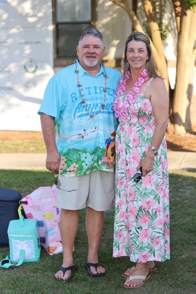 Tim & Denise Pifer at the 2026 Concerts in the Village Featuring A1A - The Official Jimmy Buffet Tribute Band in Destin, FL.